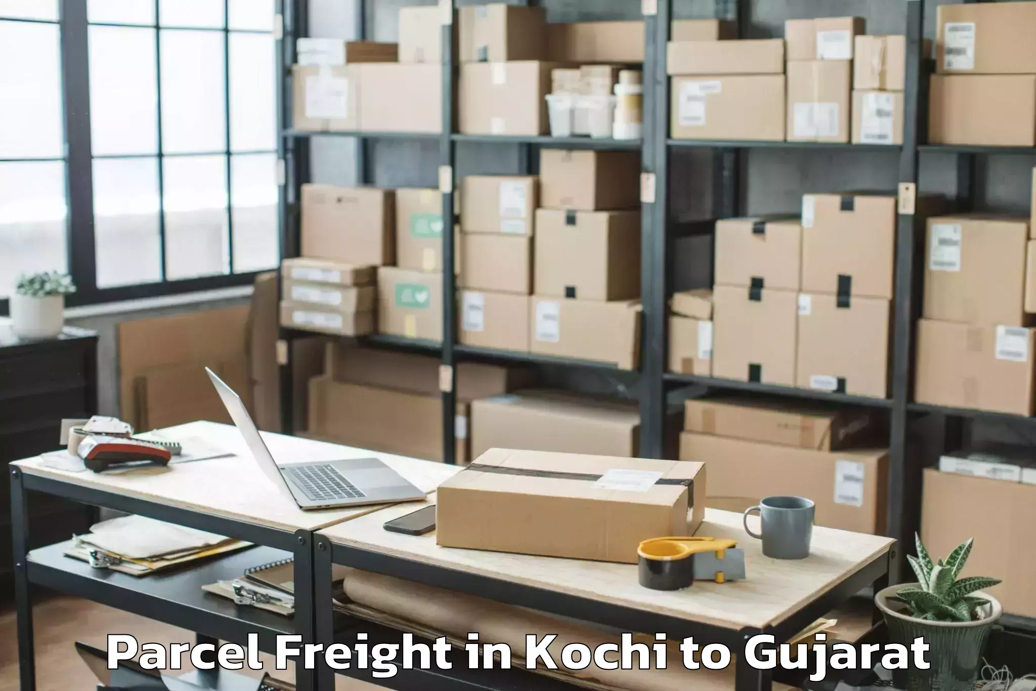 Top Kochi to Porbandar Parcel Freight Available